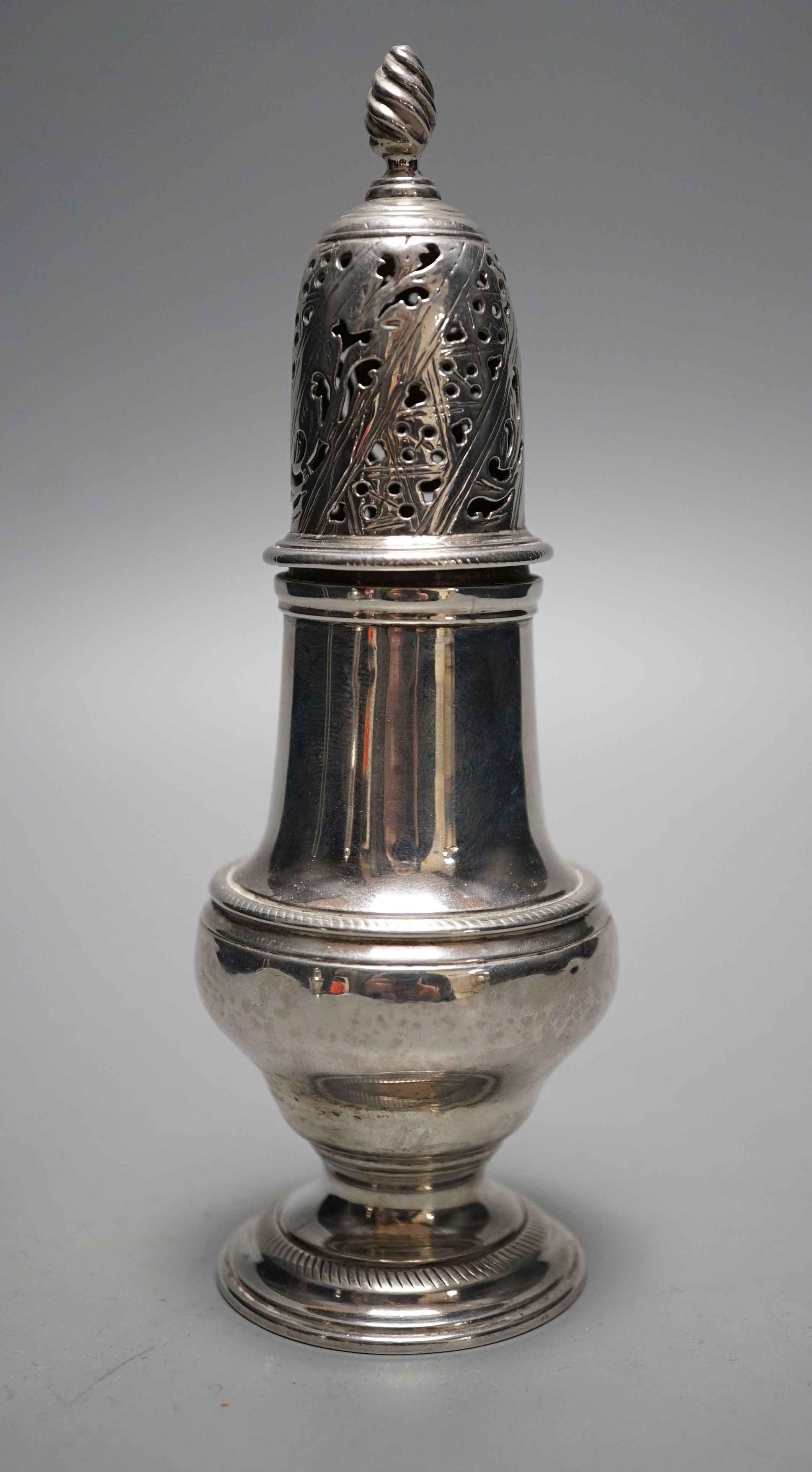 An early George III silver pepper, with interior cap with finial?, John Delmester, London, 1760, 15.2cm, 4.5oz.